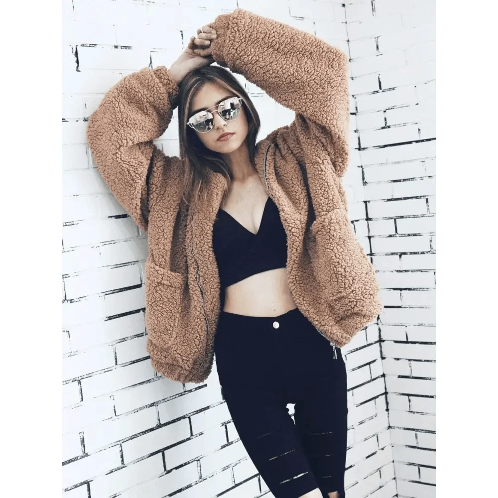 Stevvex Teddy faux fur overcoat in tan, plush zip-front coat with pockets worn with black top on Tampa Home & Garden Store