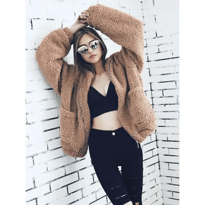 Stevvex Teddy faux fur overcoat in tan, plush zip-front coat with pockets worn with black top on Tampa Home & Garden Store