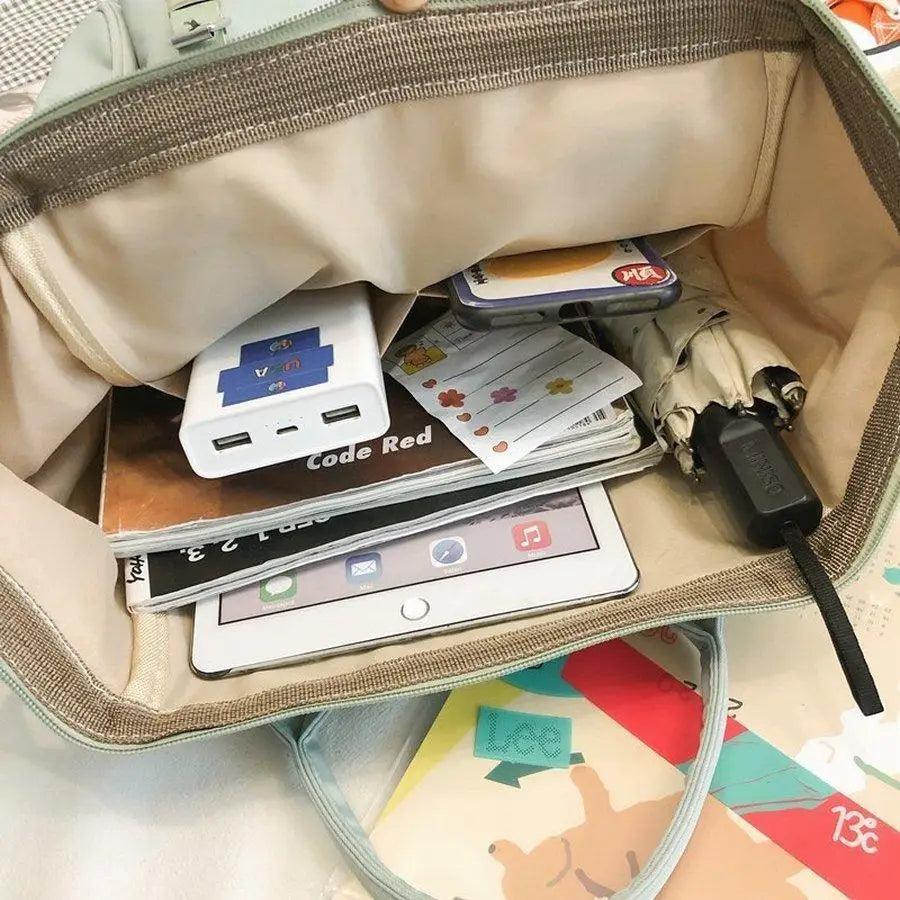 Stevvex beige patchwork laptop backpack interior view with USB charger and notebook on Tampa Home & Garden Store