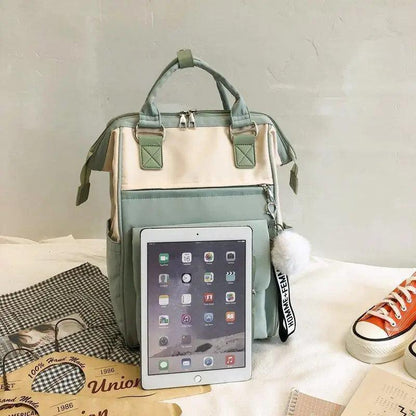 Stevvex patchwork laptop backpack green-beige with teal pocket and pom-pom keychain on Tampa Home & Garden Store