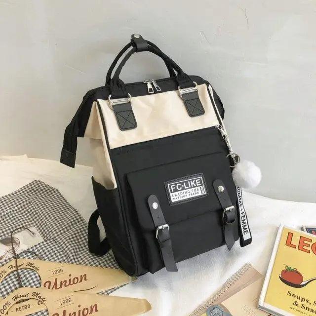Stevvex laptop backpack in black beige patchwork with front buckle pockets and top handles on Tampa Home & Garden Store