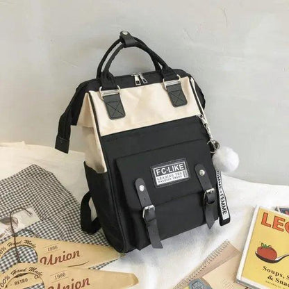 Stevvex laptop backpack in black beige patchwork with front buckle pockets and top handles on Tampa Home & Garden Store