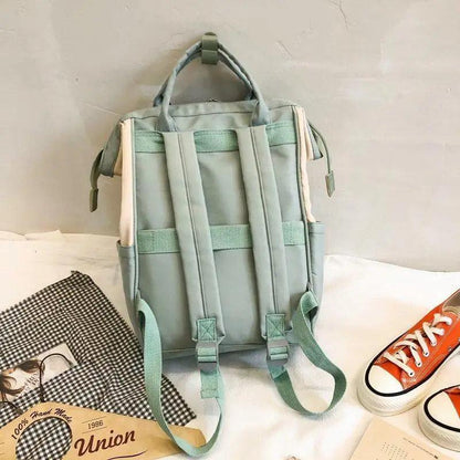 Stevvex teal laptop backpack with padded shoulder straps and top handles on Tampa Home & Garden Store