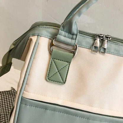Stevvex patchwork laptop backpack in teal and cream with metal zippers and top ring strap on Tampa Home & Garden Store