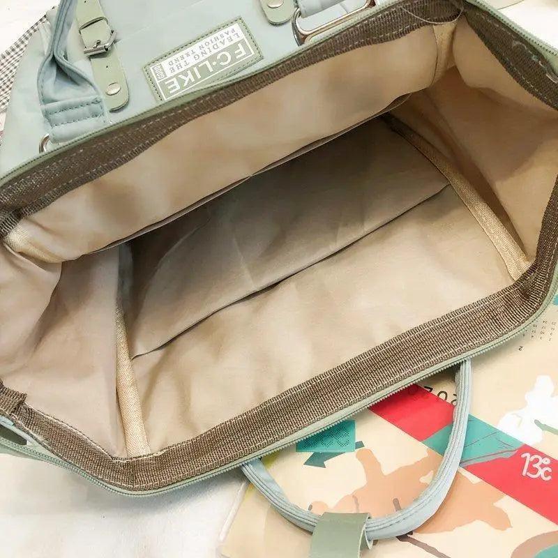 Stevvex laptop backpack, light teal exterior with beige interior, travel/school bag on Tampa Home & Garden Store