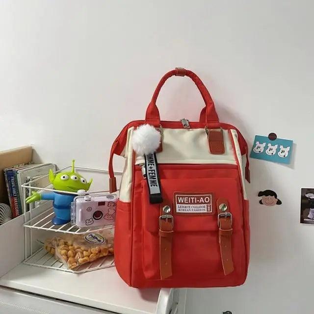 Laptop backpack red and cream with brown straps and pocket on Tampa Home & Garden Store