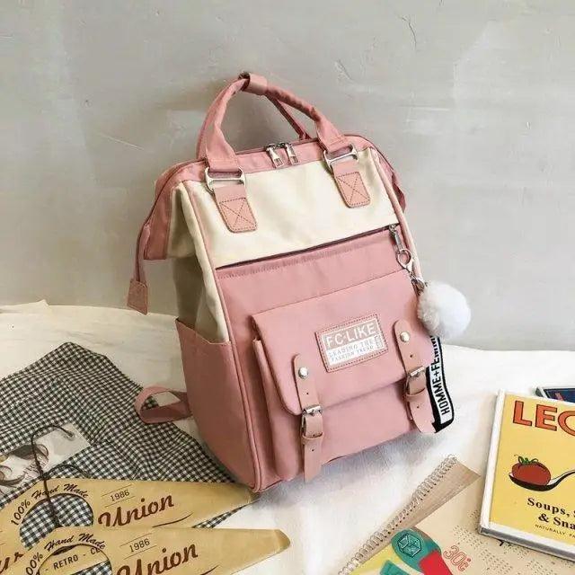 Stevvex patchwork laptop backpack in pink beige with front pocket and fluffy pom pom ring on Tampa Home & Garden Store