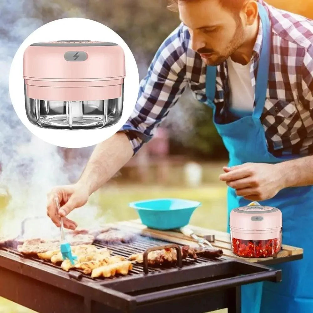 Stevvex pink electric garlic press mini chopper for garlic, ginger, chili; two units shown on Tampa Home & Garden Store
