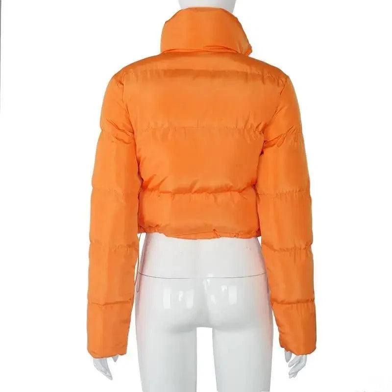 Womens orange faux PU leather bubble puffer jacket back long sleeves and zip closure on Tampa Home & Garden Store