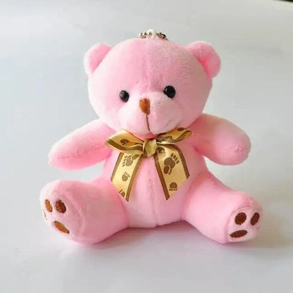 Stevvex pink teddy bear plush toy pendant with gold paw-print ribbon bow for kids on Tampa Home & Garden Store