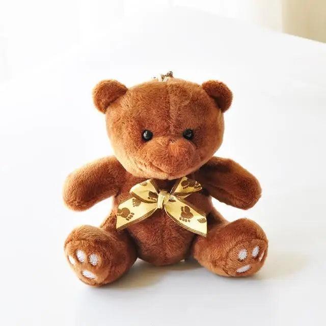 Stevvex teddy bear plush toy, small brown bear with beige footprint ribbon bow on Tampa Home & Garden Store