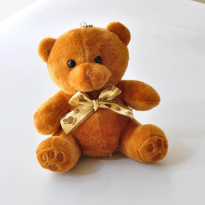 Stevvex teddy bear stuffed toy small plush bear in warm brown with beige paw print ribbon on Tampa Home & Garden Store