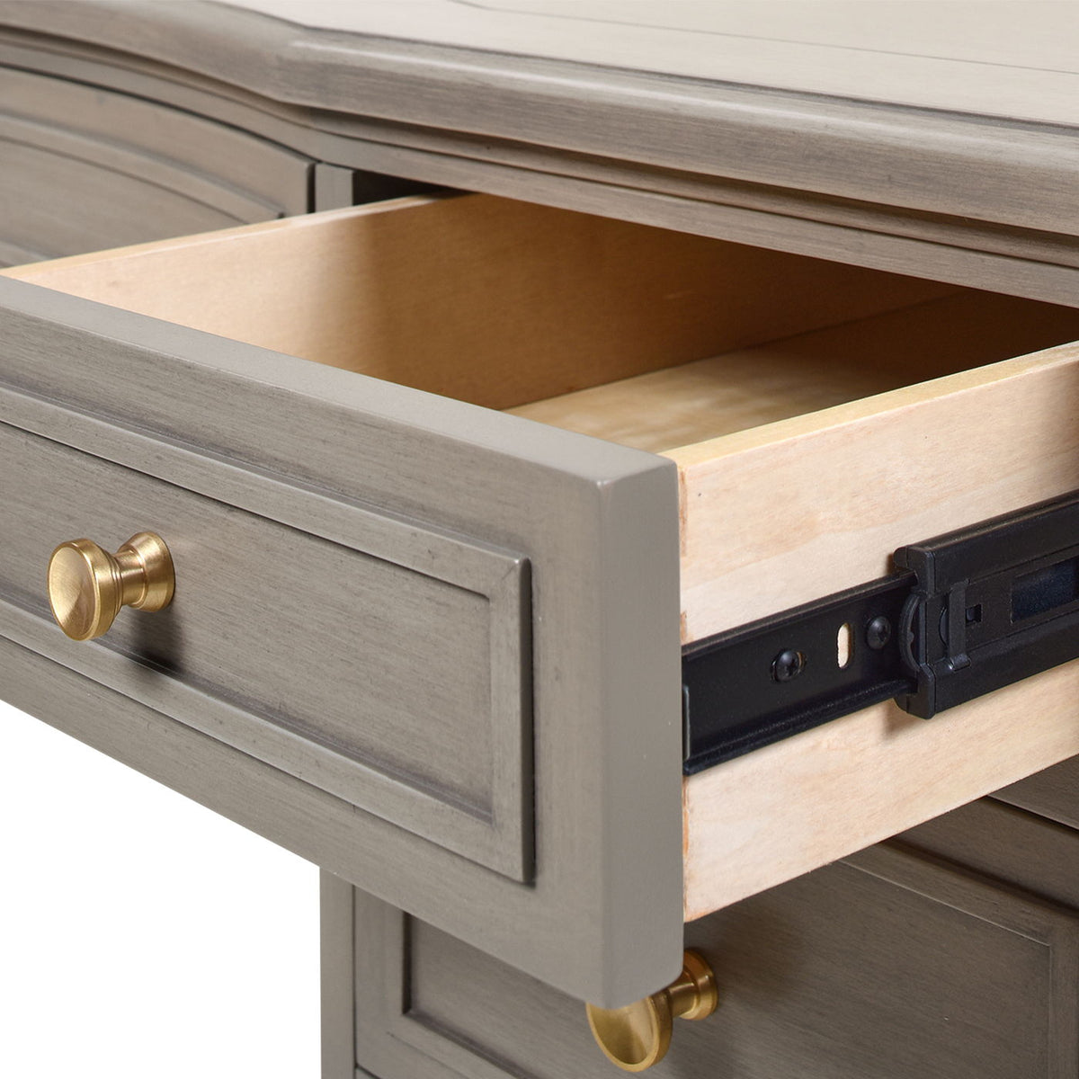 Dauphin 5-drawer executive desk gray with brass knob pulls; drawer shows light wood interior on Tampa Home & Garden Store