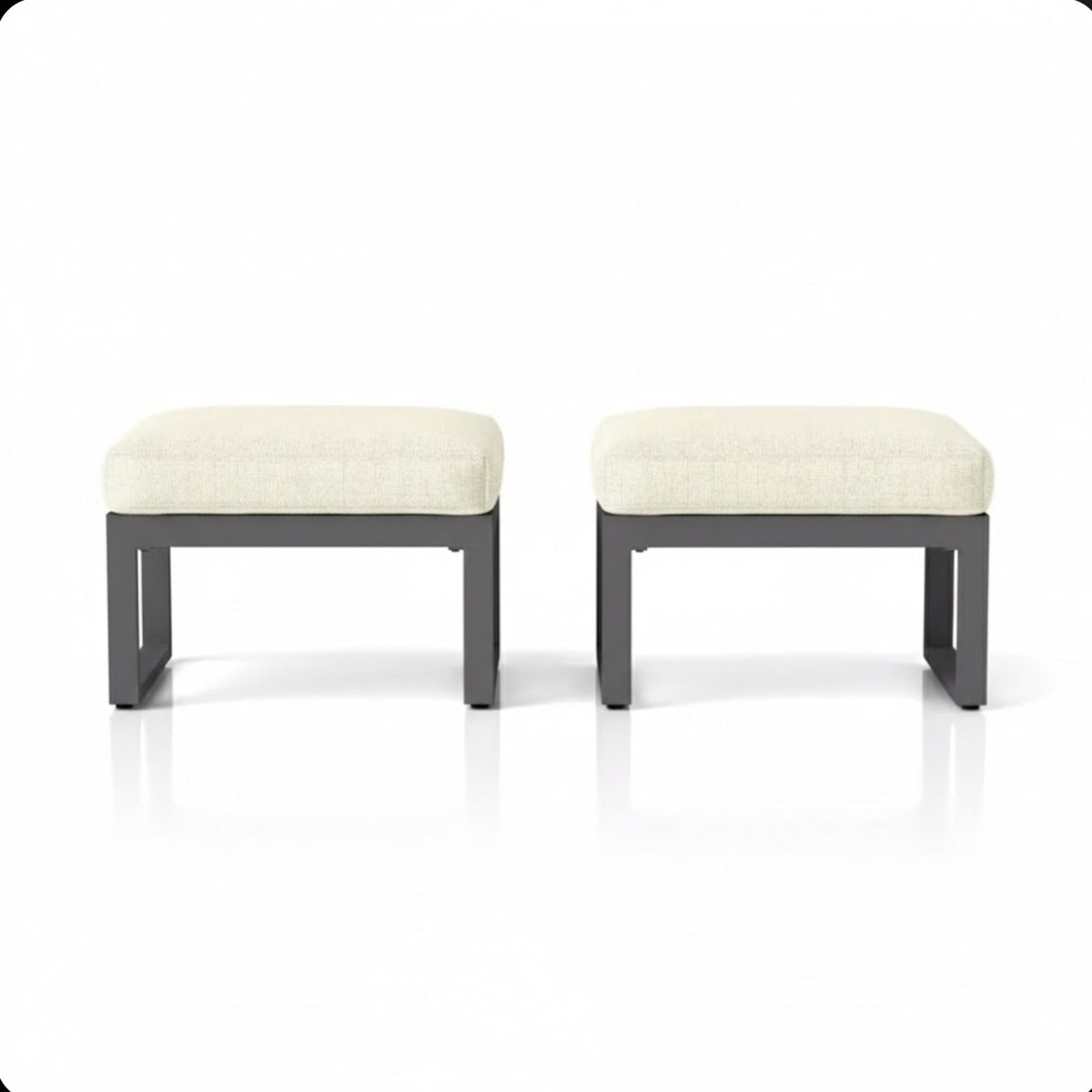 Two beige thick-cushion patio ottomans with dark gray metal frames on Tampa Home & Garden Store