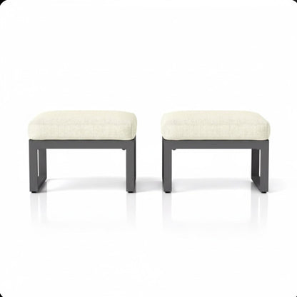 Two beige thick-cushion patio ottomans with dark gray metal frames on Tampa Home & Garden Store