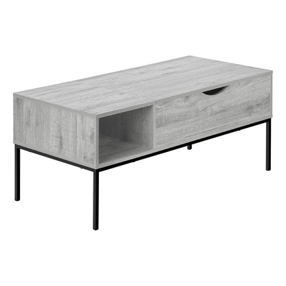 Rectangular lift-top coffee table in light wood with a right drawer and open cubby on black legs on Tampa Home & Garden Store