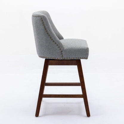 Counter height barstools set of 2; upholstered with brass nailhead trim and dark wood legs on Tampa Home & Garden Store