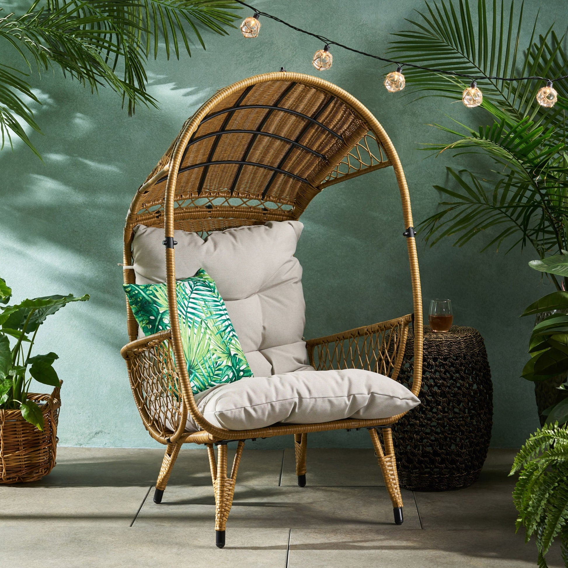 Outdoor wicker standing basket chair with cushion, tan wicker and gray cushion on Tampa Home & Garden Store