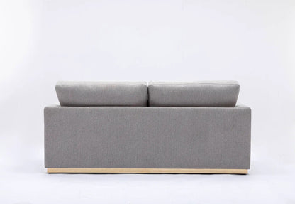 Valin linen sofa back view in gray with two cushions and light wood base on Tampa Home & Garden Store