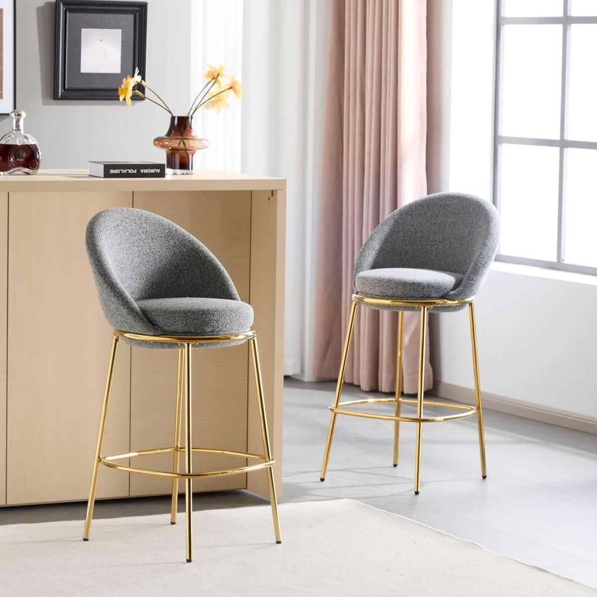 Celano Upholstered Barstool Set of 2 gray fabric seats on gold legs at wood counter on Tampa Home & Garden Store