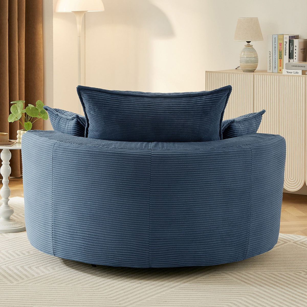 Swivel barrel chair by HouseOfZazla in navy blue with cushions, ribbed round frame on Tampa Home & Garden Store