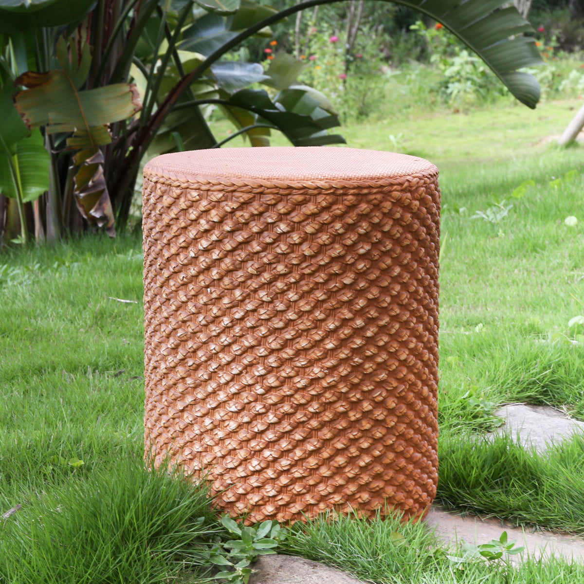 Evie Outdoor Patio Round MGO Side Table Brown woven wicker texture in garden on Tampa Home & Garden Store