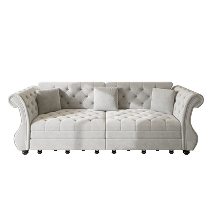 Oversized Chesterfield pull-out sofa bed in cream tufted upholstery with rolled arms on Tampa Home & Garden Store