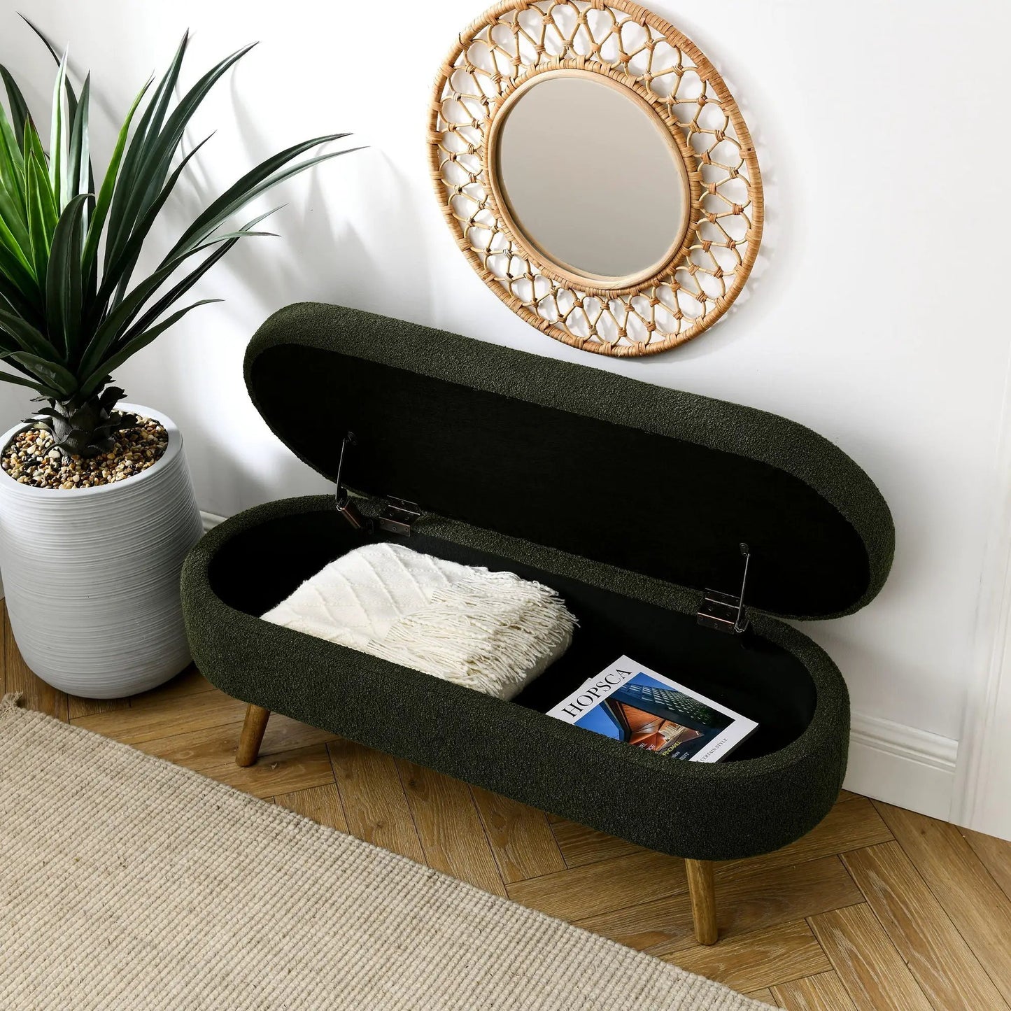 Oval green storage ottoman with rubber wood legs, white quilt inside Unique Piece Furniture on Tampa Home & Garden Store