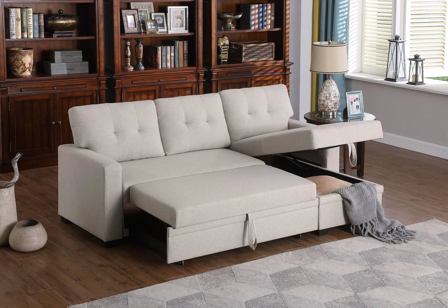 Upholstered pull-out sectional sleeper sofa with chaise in beige fabric on Tampa Home & Garden Store