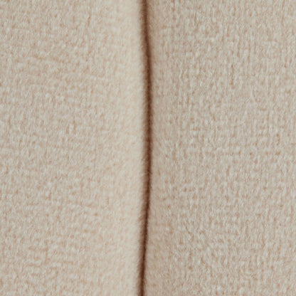 Accent ottoman beige textured upholstery close-up with seam on Tampa Home & Garden Store