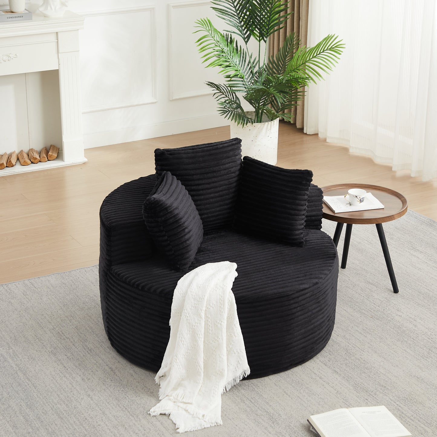 43-Inch Round Corduroy Single Sofa in black fabric by HouseOfZazla, plush circular seating in bright living room on Tampa Home & Garden Store