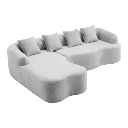 Modular L-Shape Sectional Sofa With Curved Chaise in light gray velvet fabric with five cushions on curved arms on Tampa Home & Garden Store