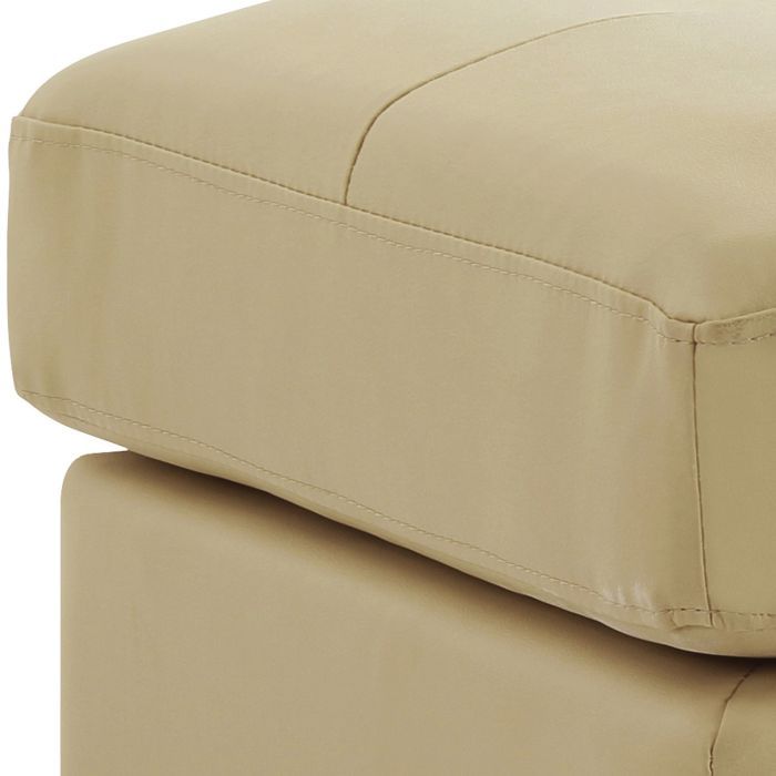 Upholstered beige ottoman in faux leather on Tampa Home & Garden Store