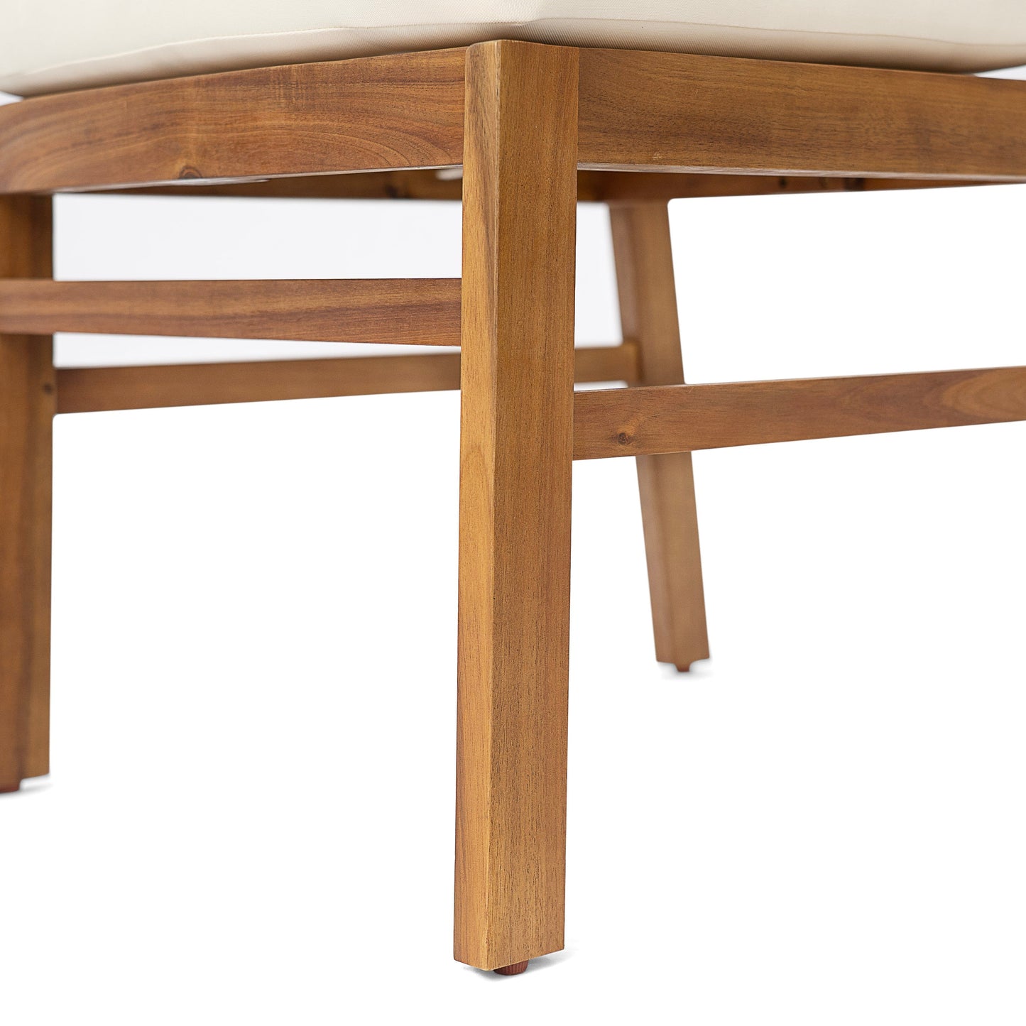 Outdoor acacia wood dining set leg detail with teak finish and beige cushion on Tampa Home & Garden Store
