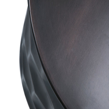 Handcrafted metal storage coffee table close-up of dark brushed surface with angular leg on Tampa Home & Garden Store