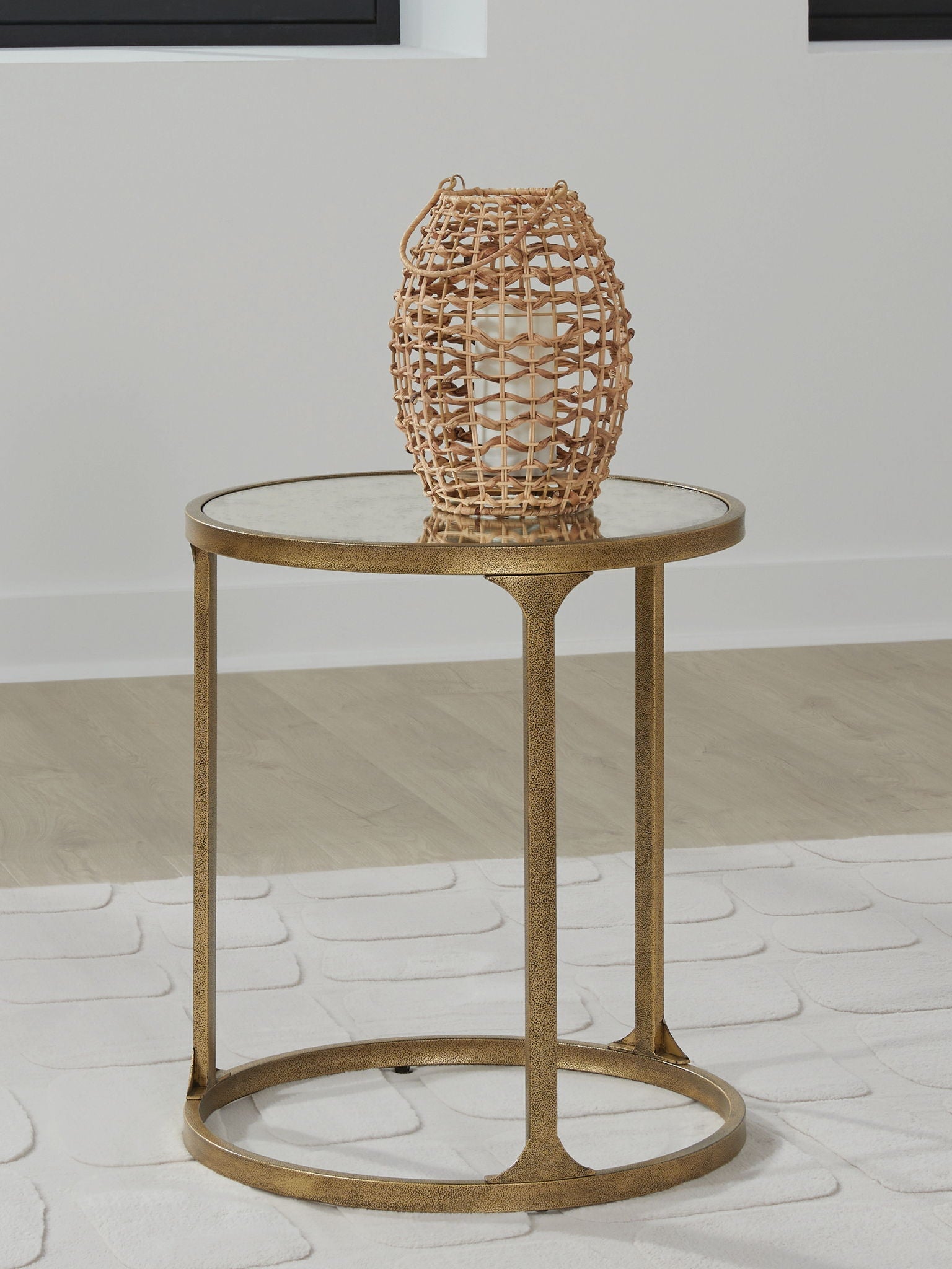 Korajane coffee table with glass top and gold frame, wicker lantern atop on Tampa Home & Garden Store