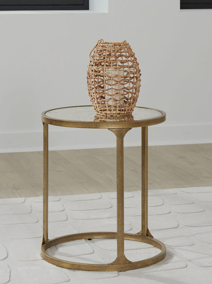 Korajane coffee table with glass top and gold frame, wicker lantern atop on Tampa Home & Garden Store