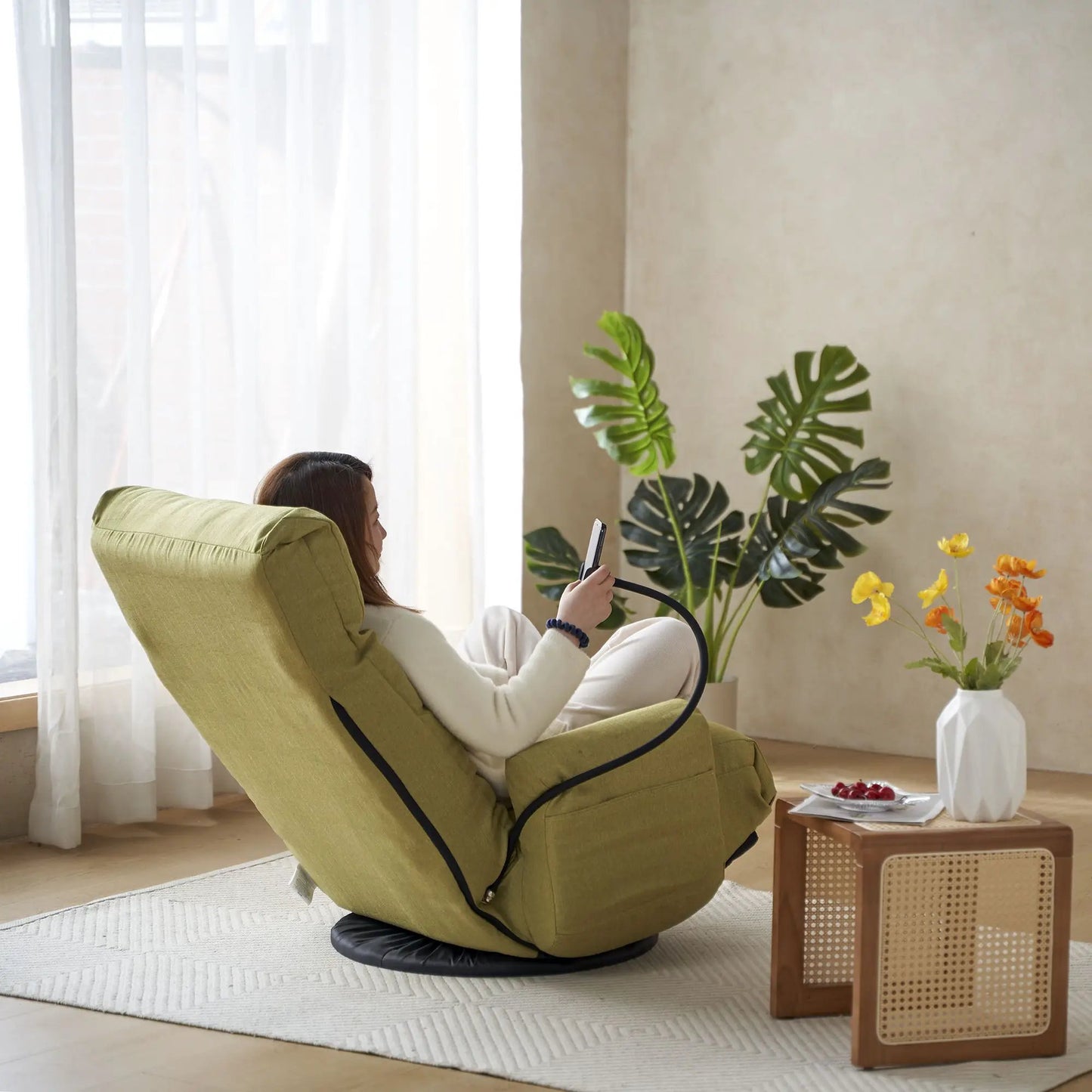 Adjustable swivel lounge chair in olive green fabric with 360° rotating seat and headrest on Tampa Home & Garden Store