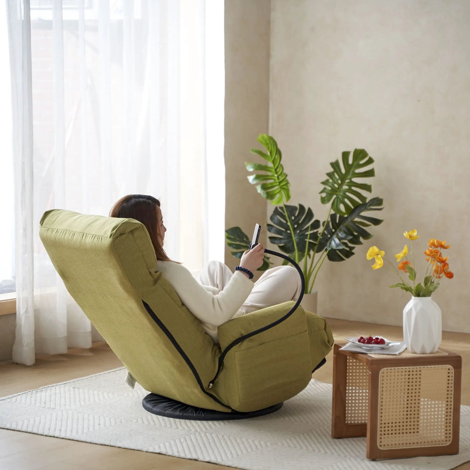 Adjustable swivel lounge chair in olive green fabric with 360° rotating seat and headrest on Tampa Home & Garden Store