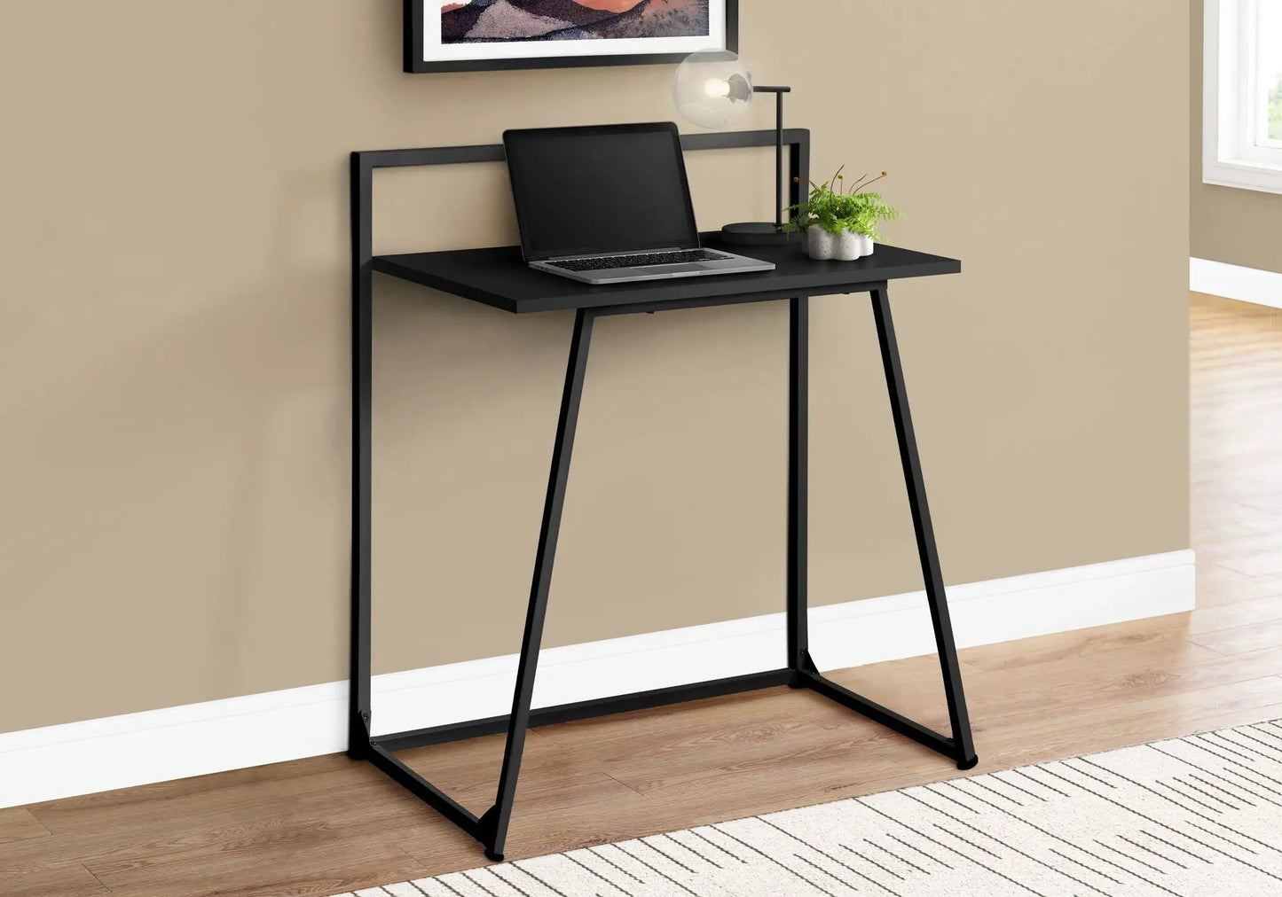 Computer desk by Unique Piece Furniture, black metal frame, slim rectangular top on Tampa Home & Garden Store
