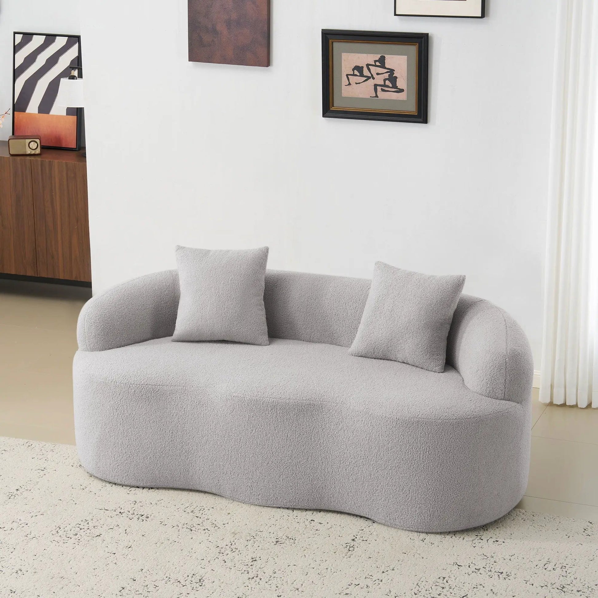 Curved loveseat sofa in grey fabric with round arms, stationary Unique Piece Furniture on Tampa Home & Garden Store