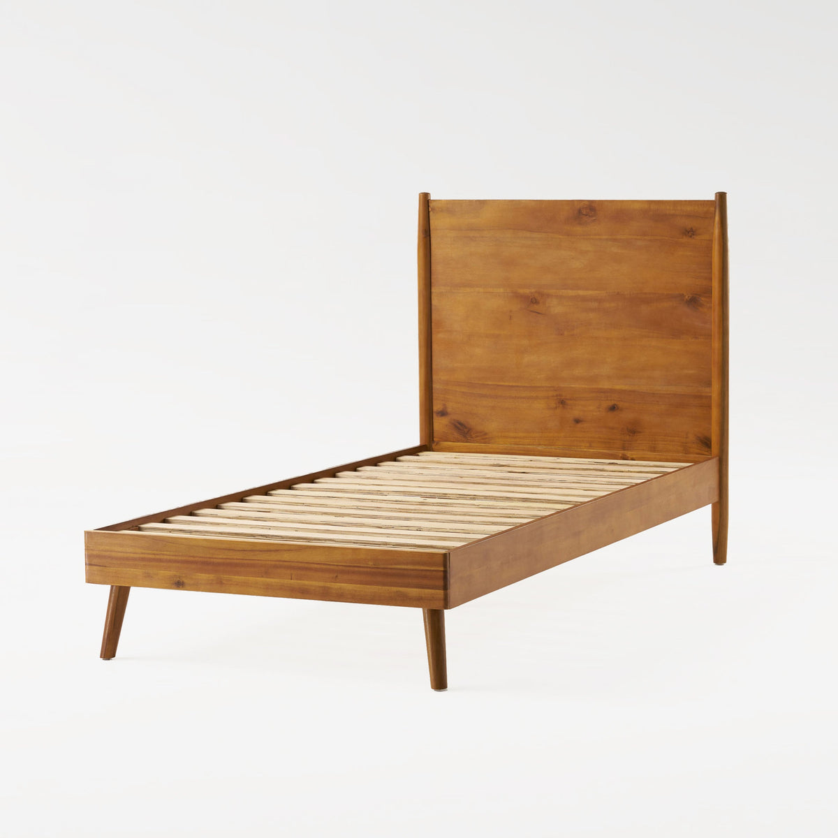 Cohron solid wood twin platform bed frame in warm brown with slatted base and tapered legs on Tampa Home & Garden Store