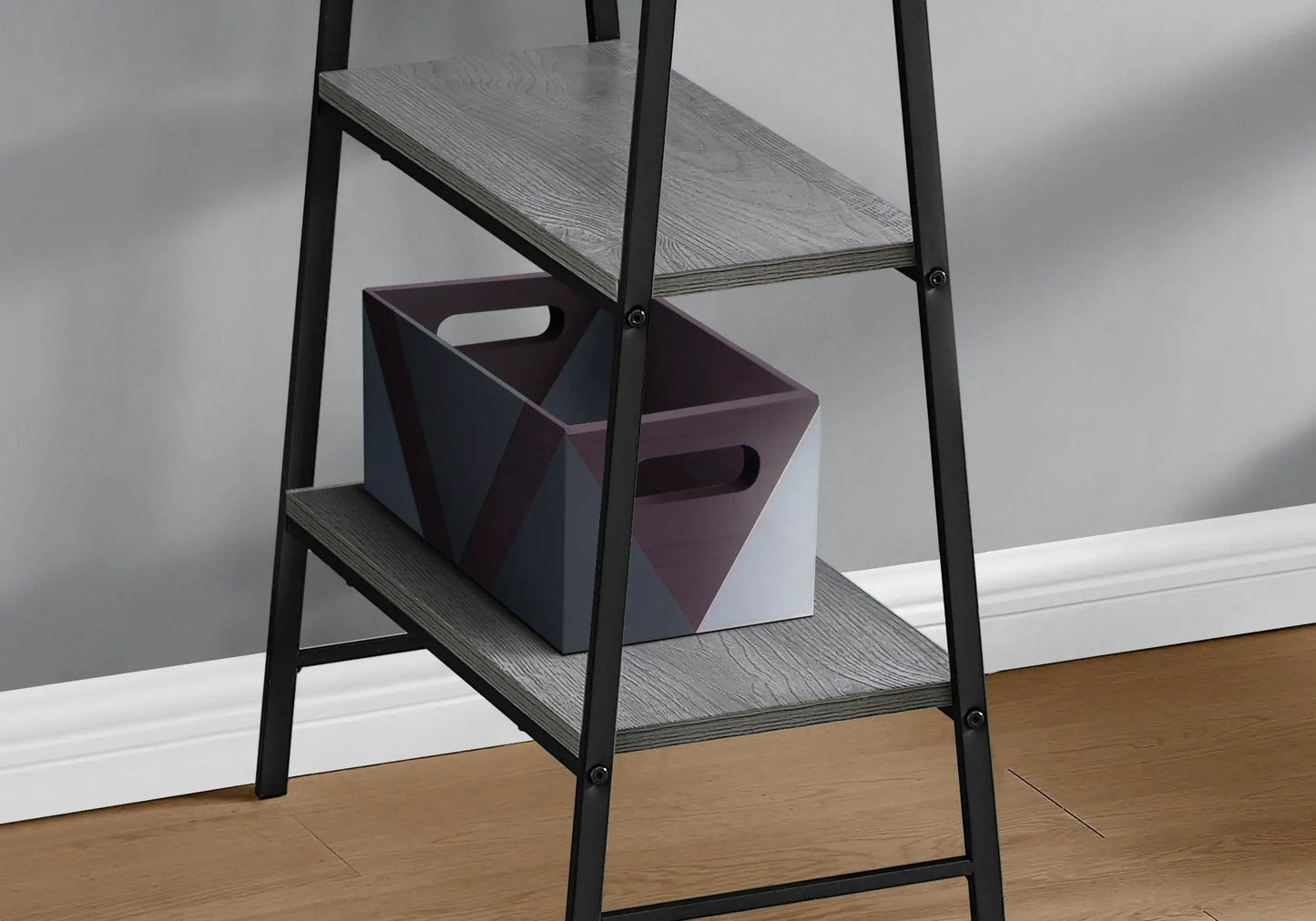 Computer desk with industrial black metal frame and gray shelves, purple storage bin on Tampa Home & Garden Store