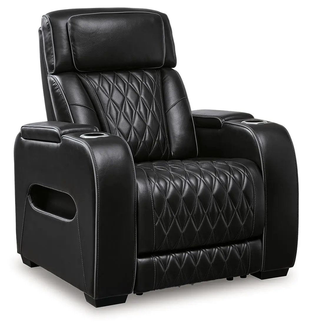 Boyington power recliner with headrest in black leather, diamond-stitched upholstery, cupholders on Tampa Home & Garden Store
