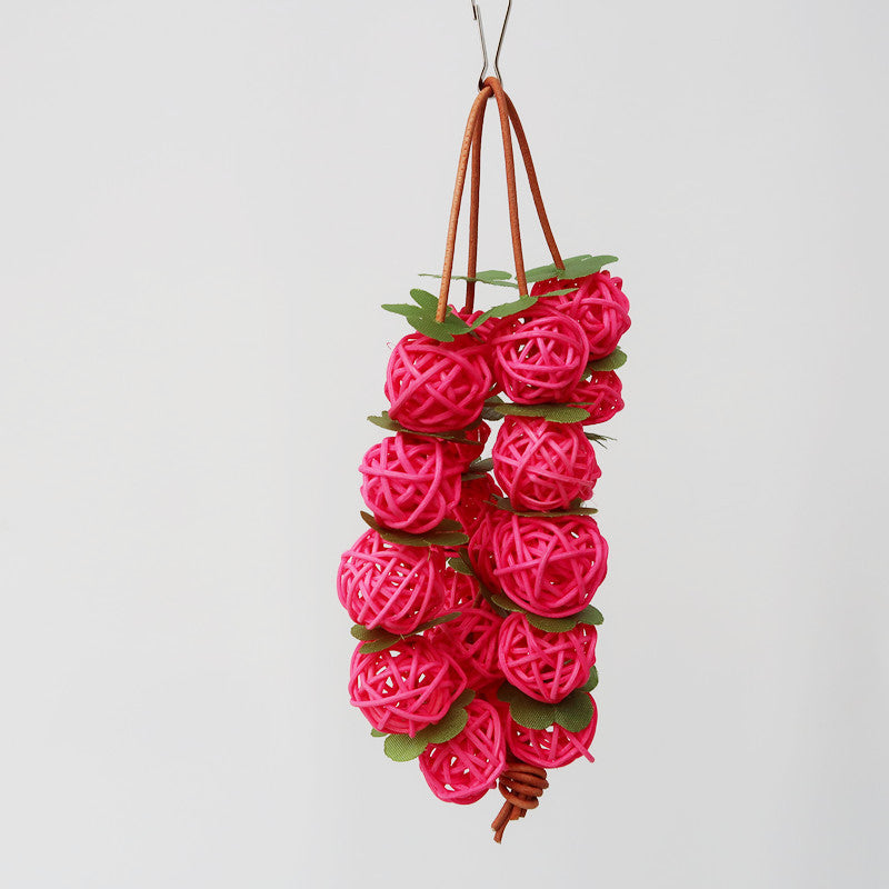 Parrot Bird Simple Wooden Chew Toy pink woven ball cluster with green leaves hanging on Tampa Home & Garden Store