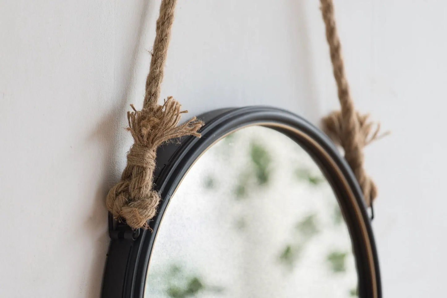 Handsome Cleveland Mirror with rope strap, round metal frame for wall decor on Tampa Home & Garden Store