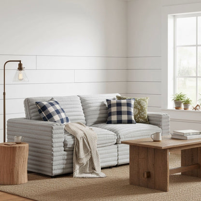 Jenny 2 Piece Sofa Sectional gray with blue plaid cushions in a bright modern living room on Tampa Home & Garden Store
