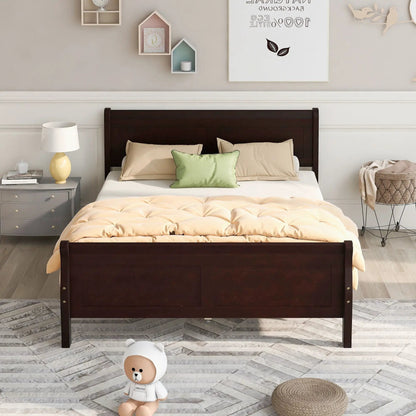 Platform bed frame in dark wood with headboard and footboard, beige bedding and green pillow on Tampa Home & Garden Store