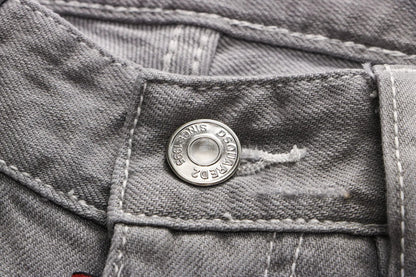 Grey Hong Kong Feng Shui wash men's jeans close-up of pocket with metal button and red tag on Tampa Home & Garden Store