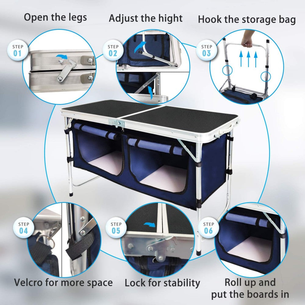 Folding camping table and storage compartment